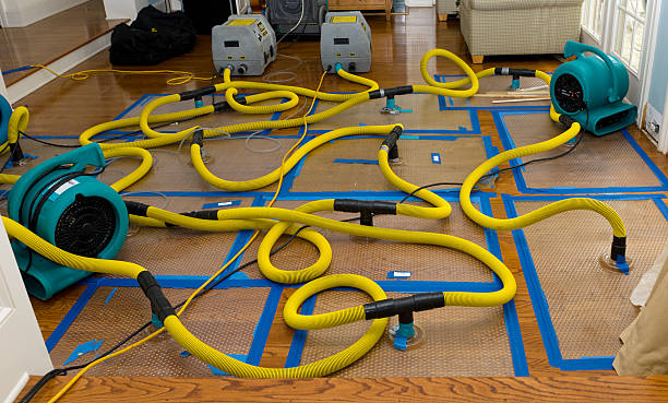 Professional Flood Damage Restoration technician working in Madras, OR